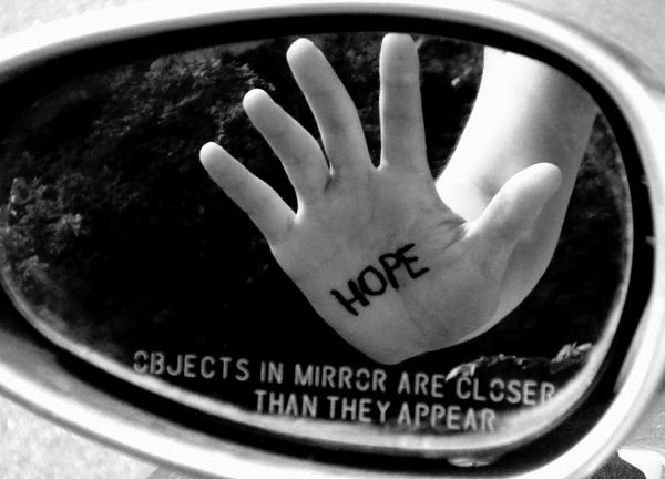 Objects in the mirror are closer than they appear